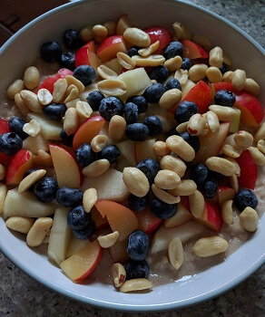 Nutty Oatmeal Porridge With Pear, Berries and Plums Recipe